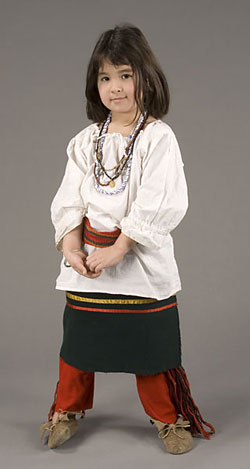model wearing white shirt, dark skirt and red leggings