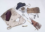 photo of haversack with contents displayed next to it