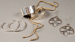 silver earrings and bracelets