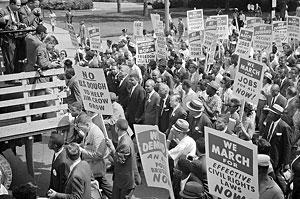 file:/activities/oralhistory/cappics/romer1963_placards, alt: Protestors holding placards during the March on Washington